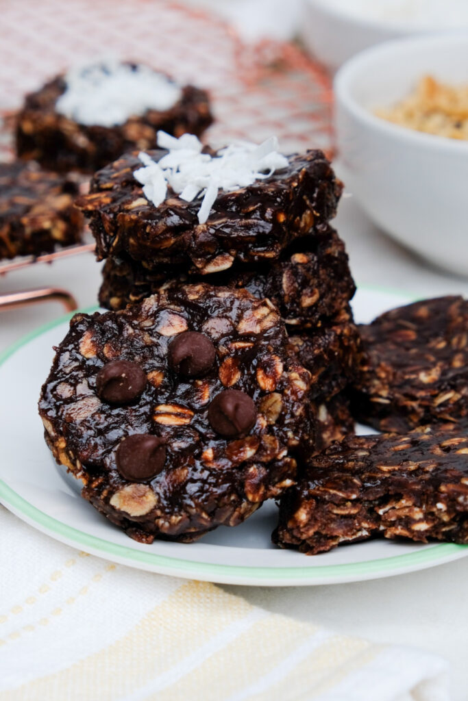 Chocolate oatmeal no bake cookies on a white plate. 