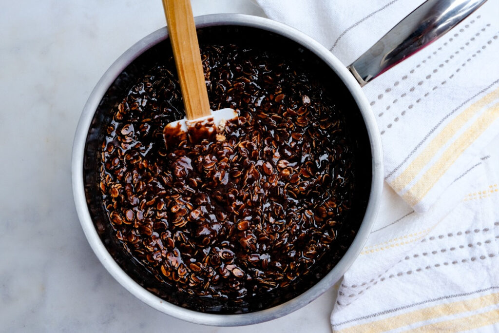 No-bake cookie mix with peanut butter in a saucepan.