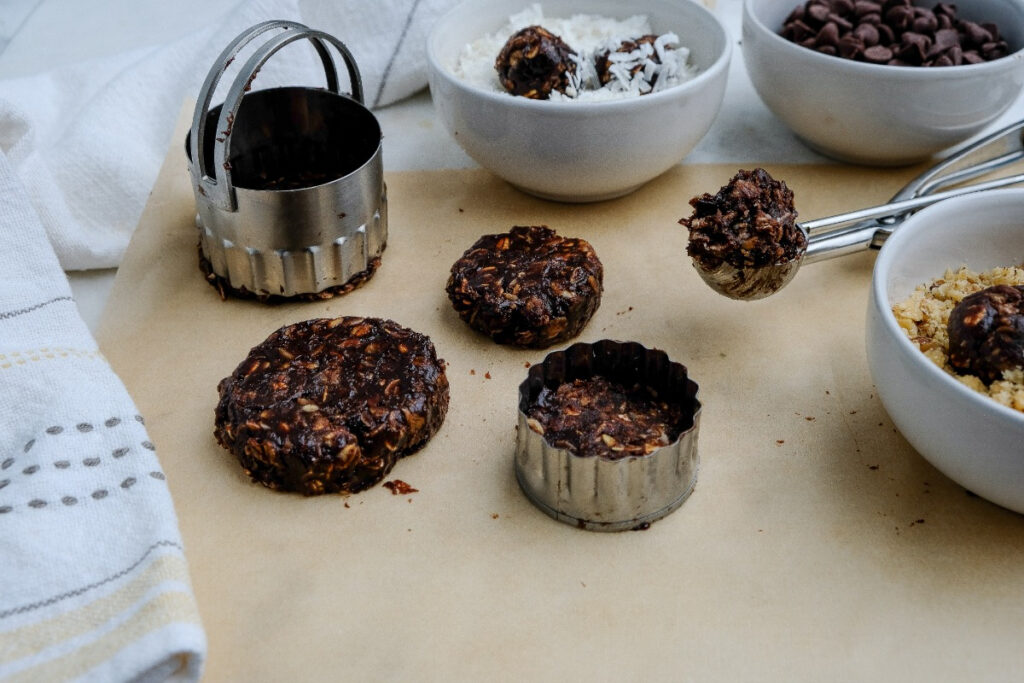 No-bake chocolate peanut butter oatmeal cookies on parchment paper. 