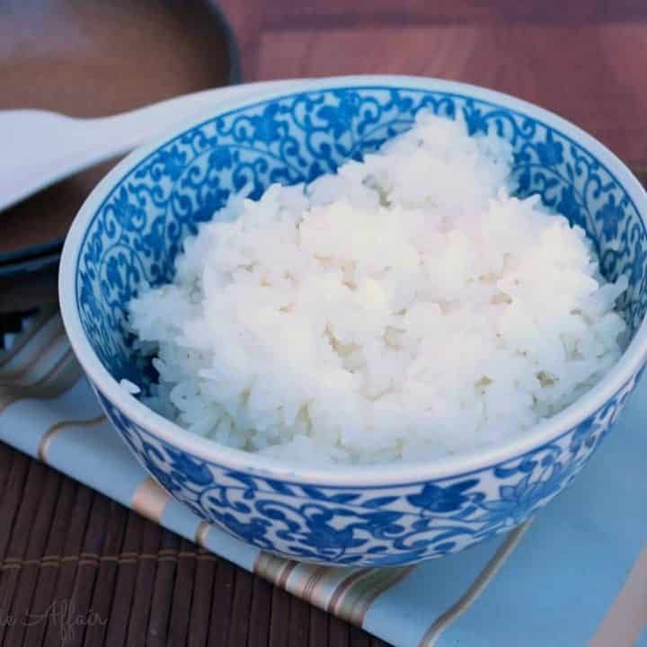 Sticky rice in a blue and white bowl