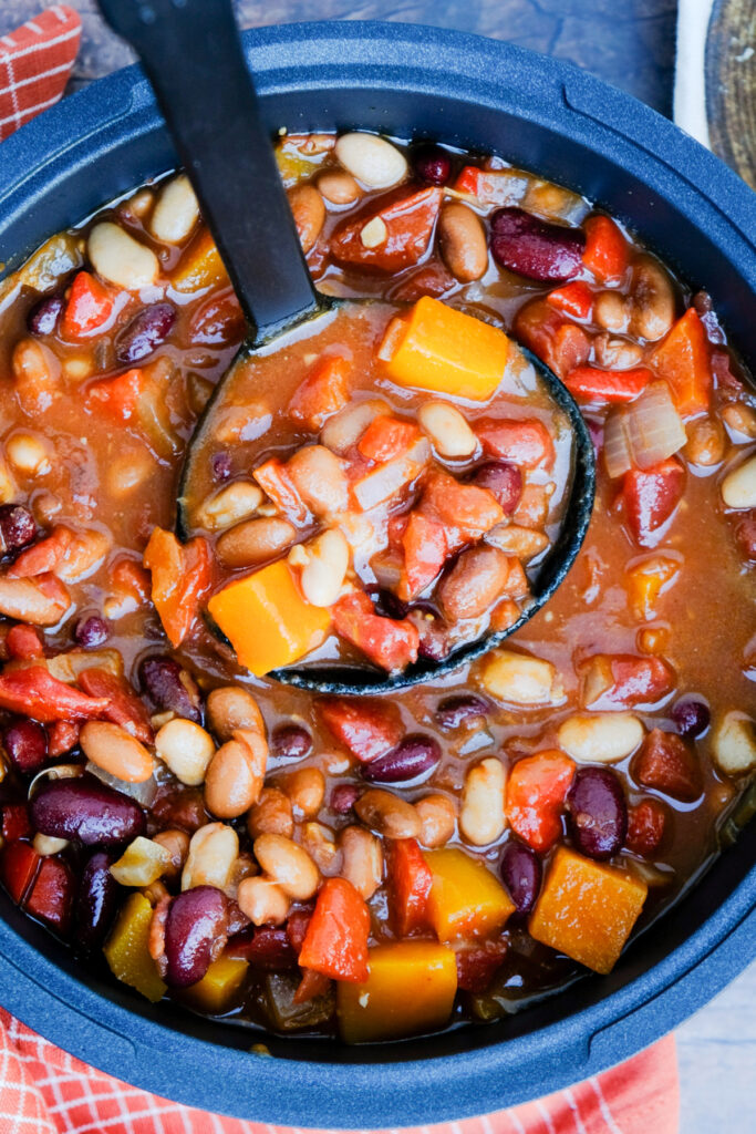 Chili in a stock pot with butternut squash.