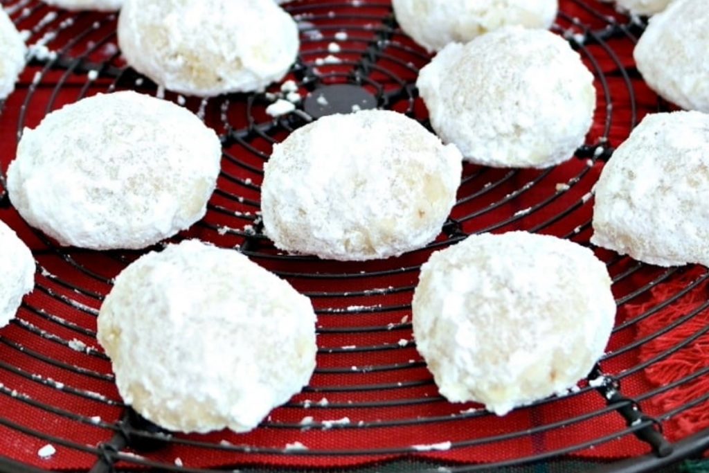 Mexican cookies on a cooking rack.