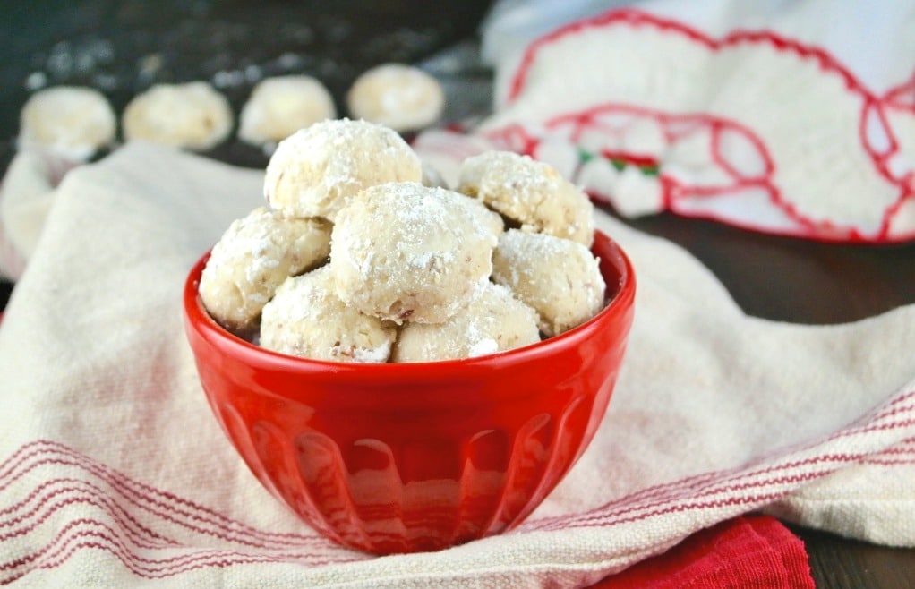 red bowl filled with Mexican wedding cookies