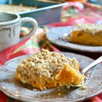 coffee cake made with sweet potatoes on a tan plate