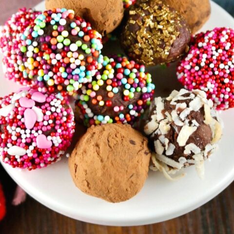 Chocolate ganache truffles rolled in sprinkles and cocoa powder