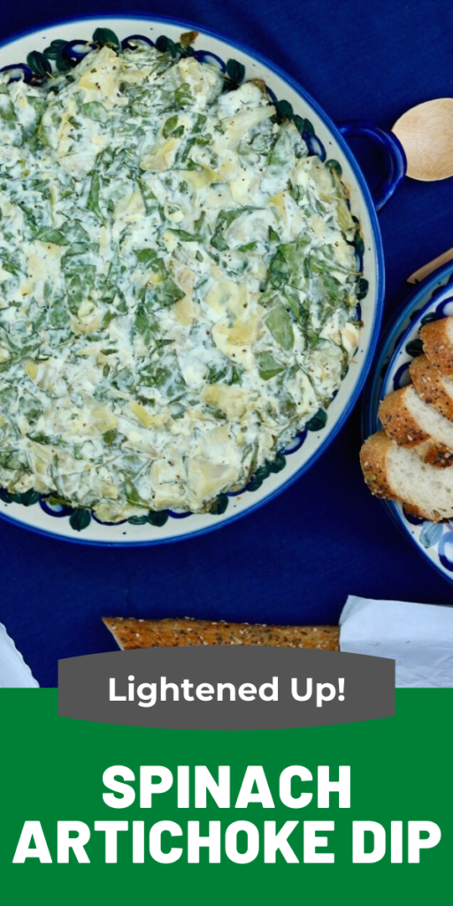 Classic spinach artichoke dip lightened up with Greek yogurt and low fat cream cheese.  Enjoy this bubbling hot dip with sliced baguette pieces or vegetables! #appetizer #spinach #dip 