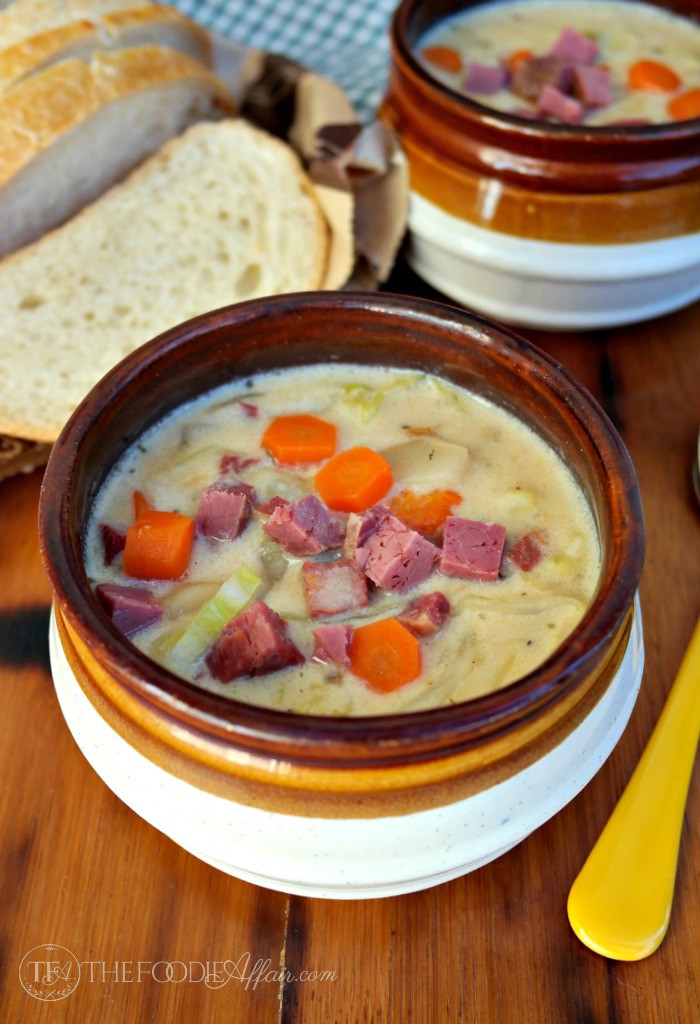 Corned beef and cabbage chowder in a brown bowl