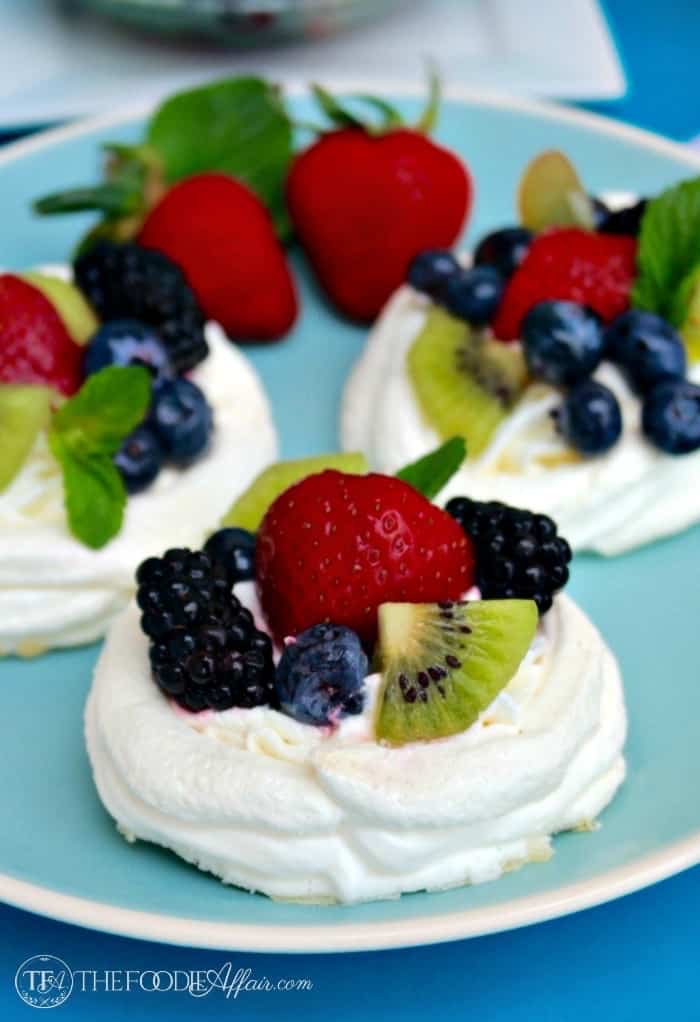 Individual Pavlova Nests topped with fresh fruit