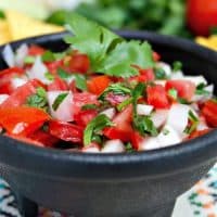 Pico de Gallo a fresh salsa in a black serving bowl