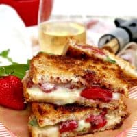 Strawberry Balsamic Brie Grilled Cheese on a striped pink plate