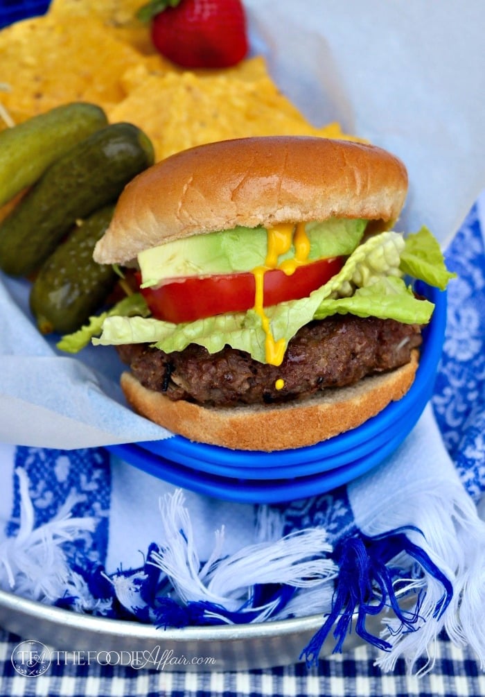 grilled hamburgers with lettuce and tomato