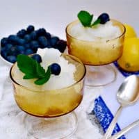 Lemon Ice in a yellow serving dish with blueberries