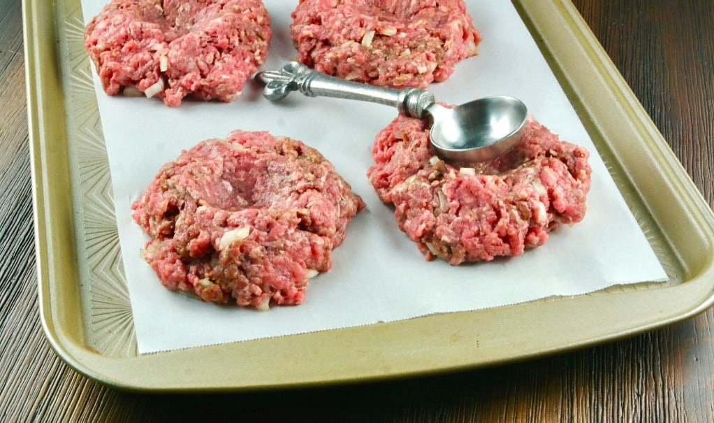 patties on a baking sheet for grilled hamburgers