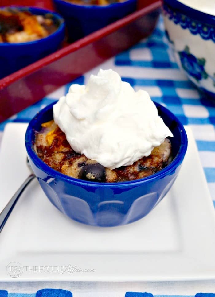 Mango Blueberry Bread Pudding topped with ice cream, whipped cream or Berry sauce! The Foodie Affair
