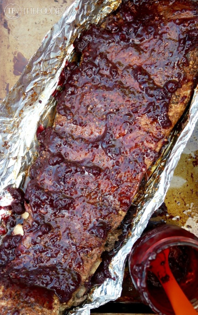 Easy oven baked ribs with blueberry bourbon sauce - The Foodie Affair