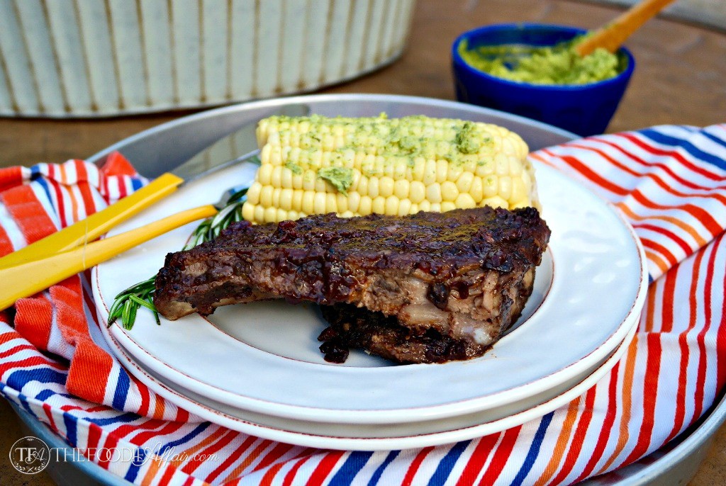 Easy oven baked ribs with blueberry bourbon sauce - The Foodie Affair