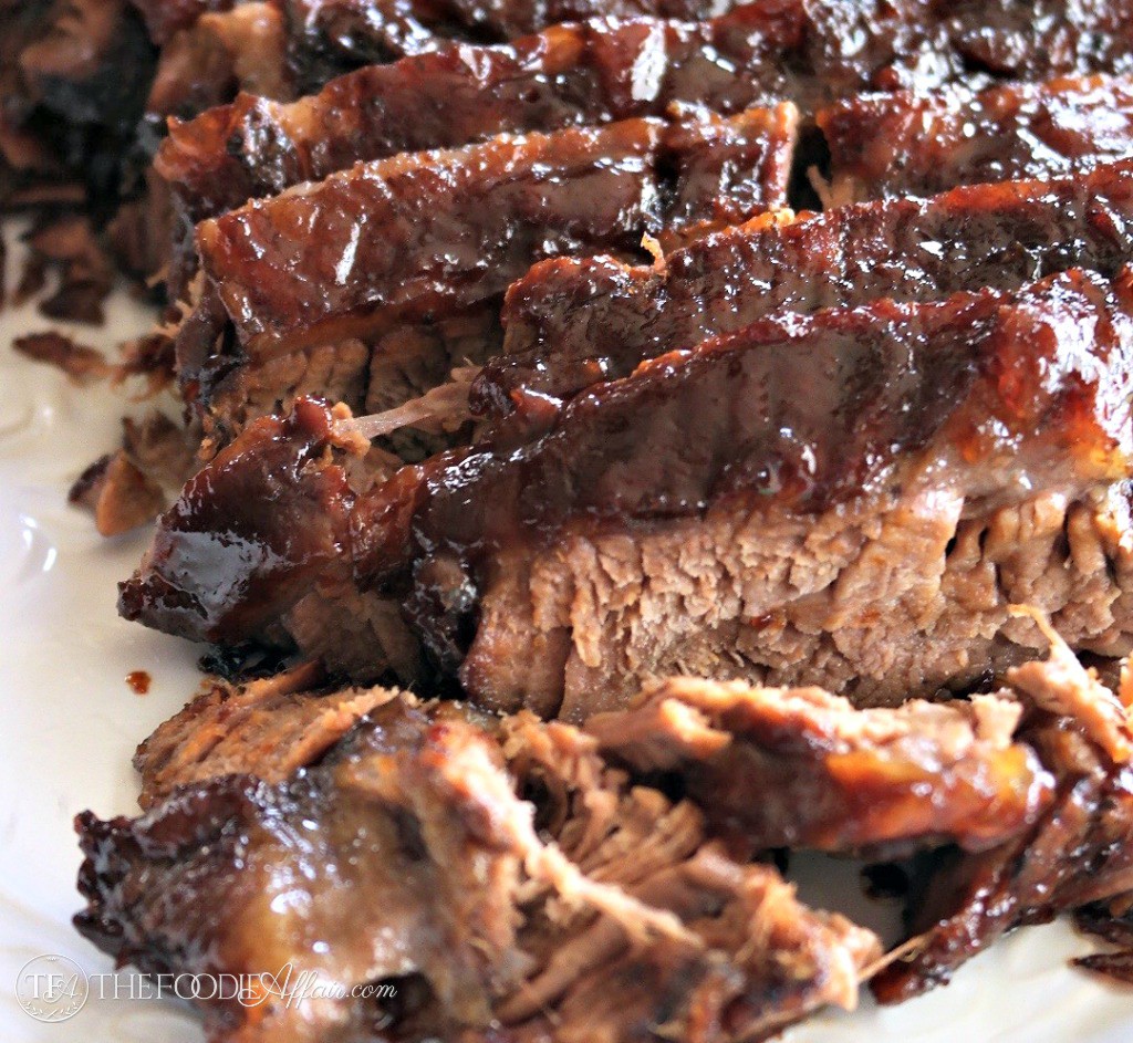 Slices of oven cooked barbecue brisket 