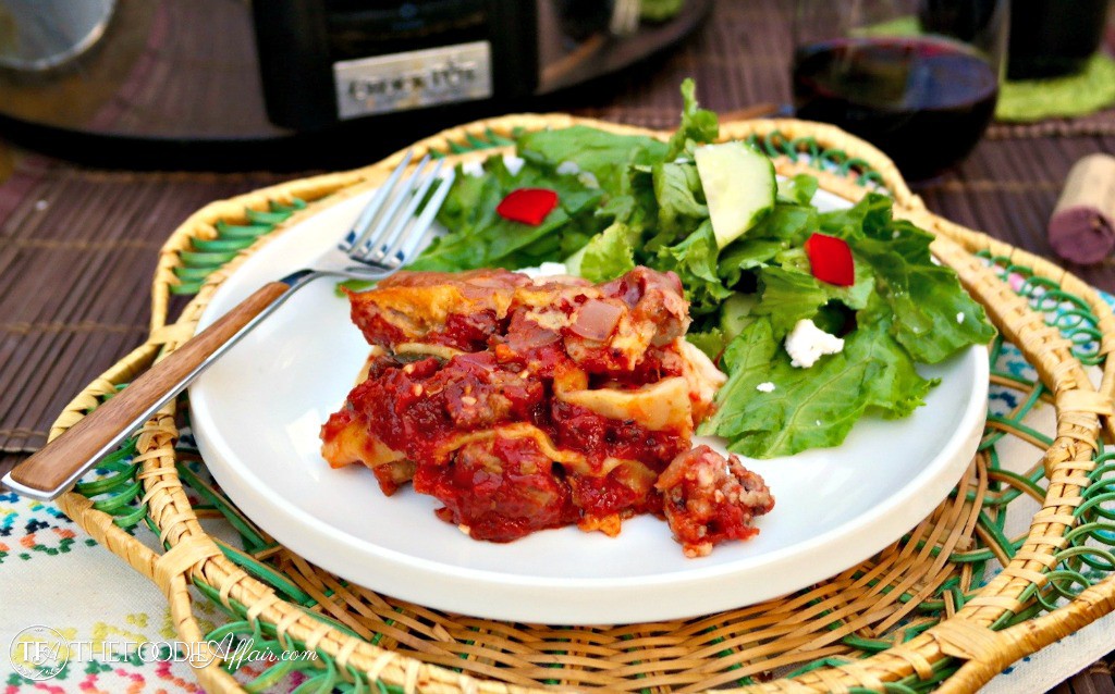 Easy lasagna made with no boil noodles and cooked in a slow cooker - The Foodie Affair