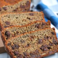 Here we see a few slices of the banana bread with chocolate chips stacked up and ready to be shared.