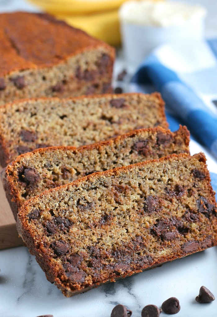 Here we see a few slices of the banana bread with chocolate chips stacked up and ready to be shared.