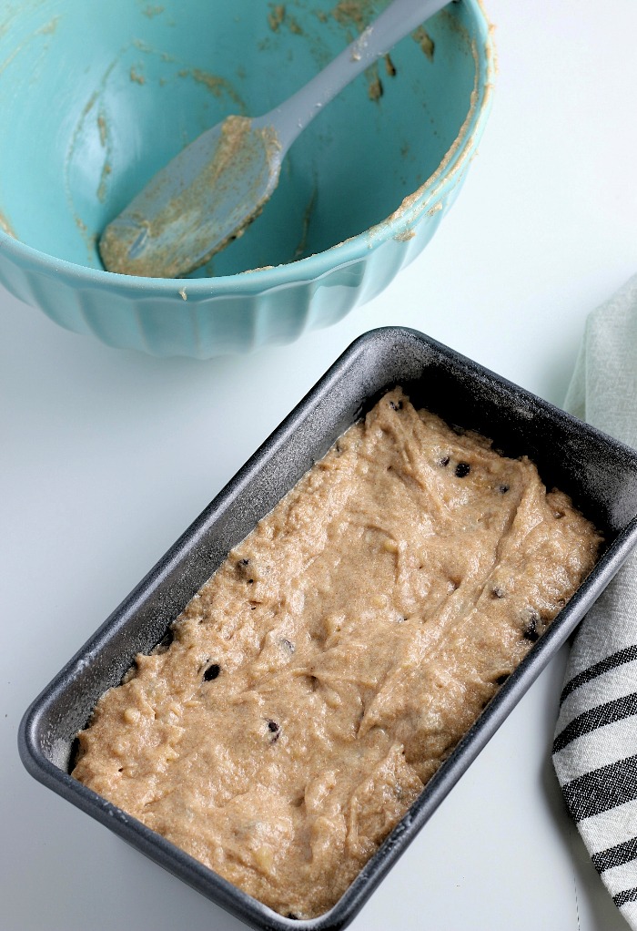 Now the batter is in the loaf pan and ready to be baked into our perfect chocolate chip banana bread recipe. 