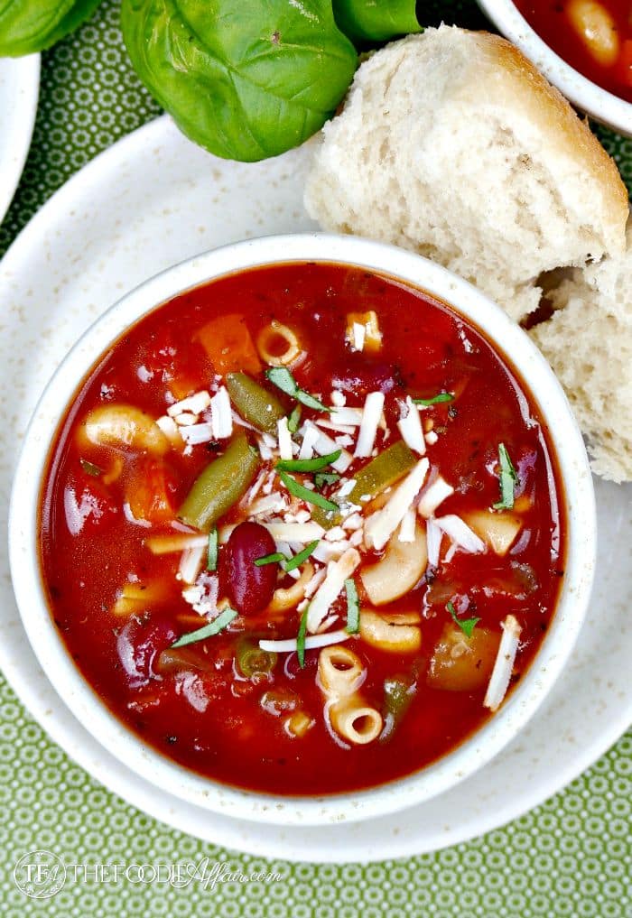 This healthy and delicious Minestrone Soup is pure comfort food! Made with a variety of vegetables and a unique pasta make from chickpeas. Try this high protein, gluten-free dish! The Foodie Affair