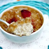 Oatmeal Brûlée topped with a caramelized brown sugar crust in a white bowl