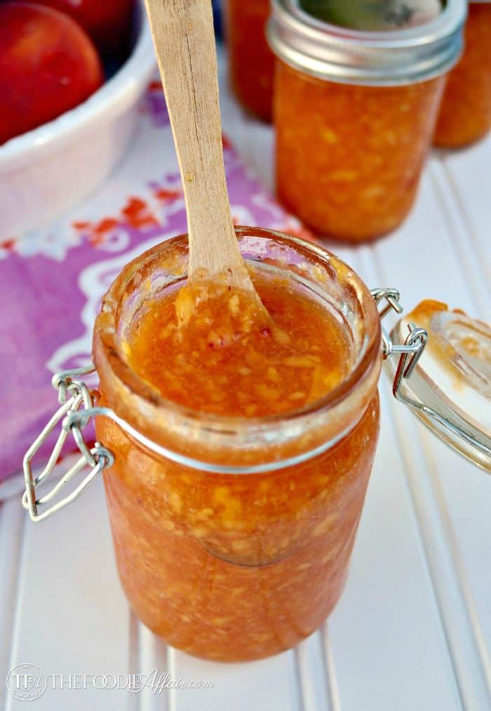 Peach freezer jam in a mason jar