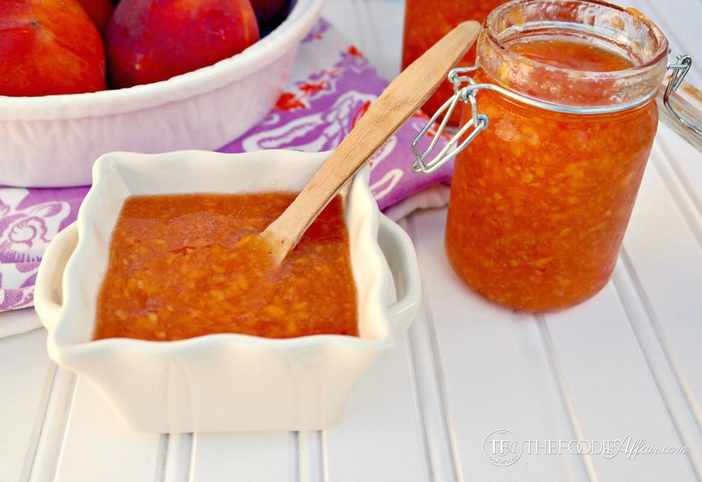 peach freezer jam in a white bowl and glass mason jar