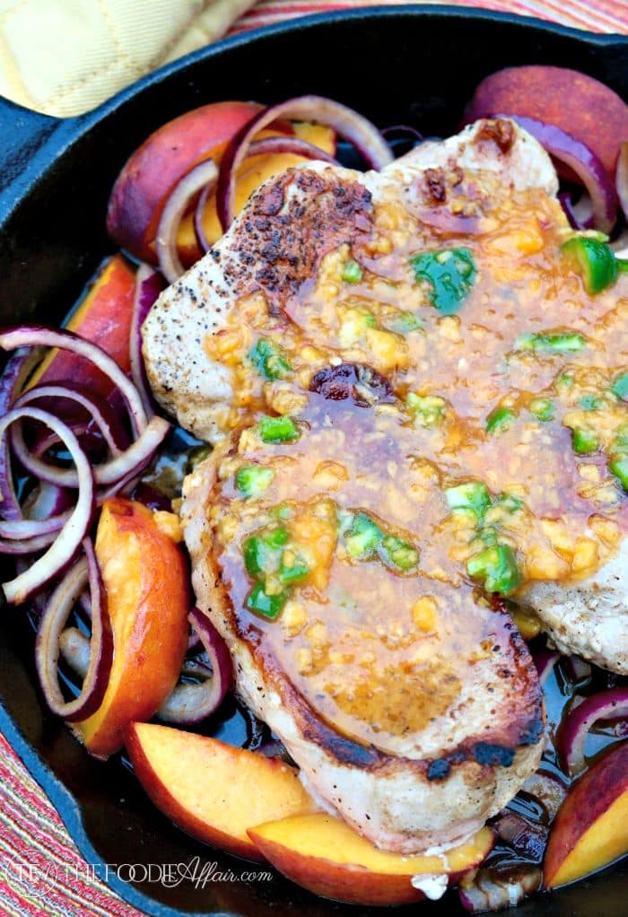 Skillet Pork Chops with Peach Jalapeno Glaze. This simple and flavorful skillet meal comes together quickly and is suitable for serving guests! The Foodie Affair