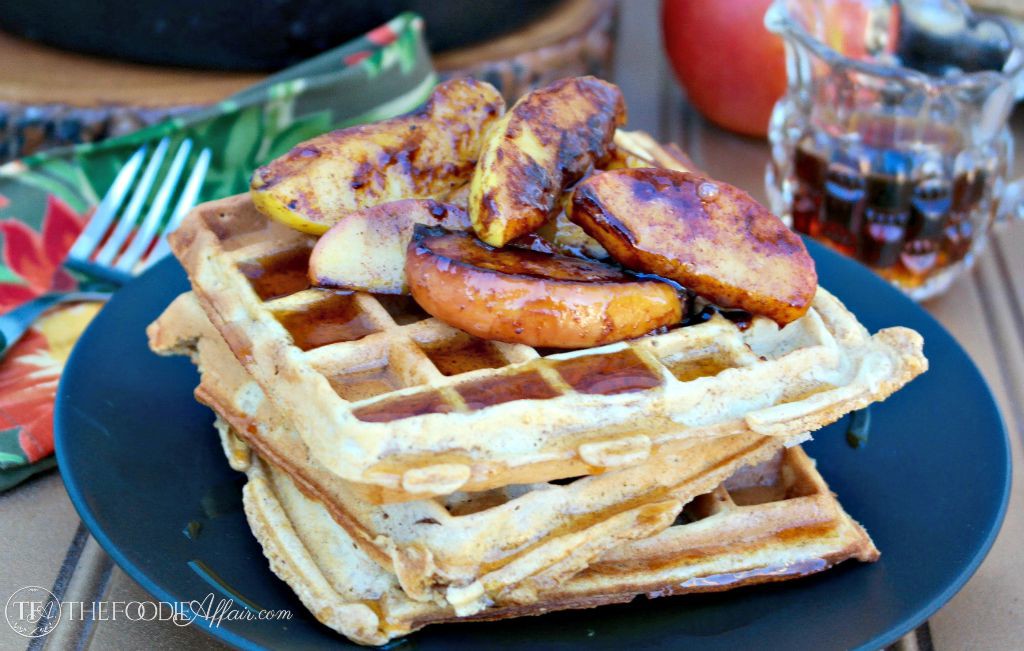 Apple Spice Waffles made with whole wheat and fresh grated apples topped with pan fried caramelized apples. The Foodie Affair 