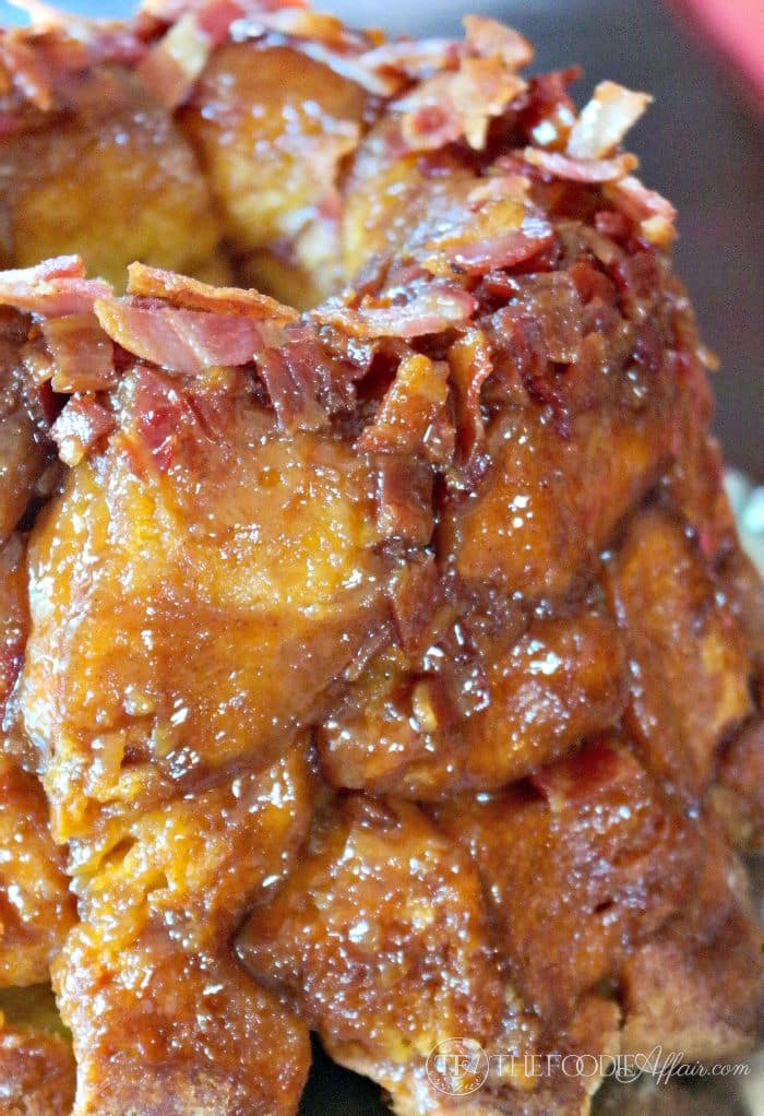Maple Bacon Monkey Bread oozing with a caramel sticky sauce that is baked with the bread for a delicious sweet treat! The Foodie Affair
