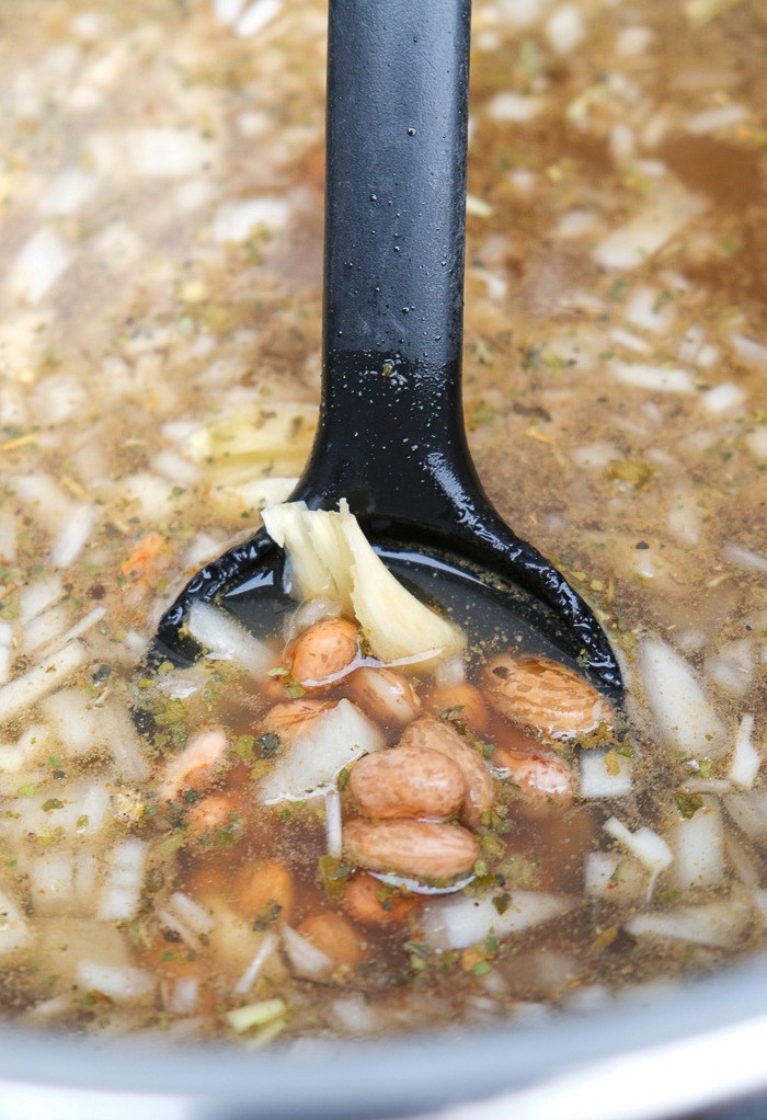 Mexican beans with all the ingredients to cook in a slow cooker.