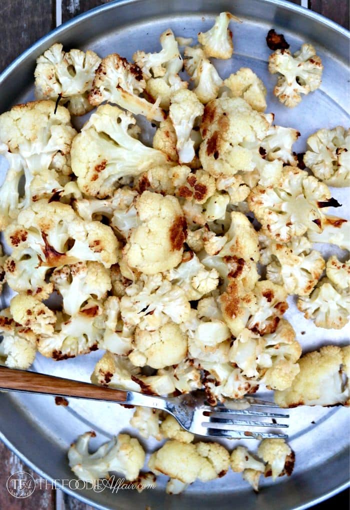 Parmesan roasted cauliflower is a simple and flavorful side dish to any main meal. The slightly nutty flavor is enhanced with a sprinkle of cheese. The Foodie Affair