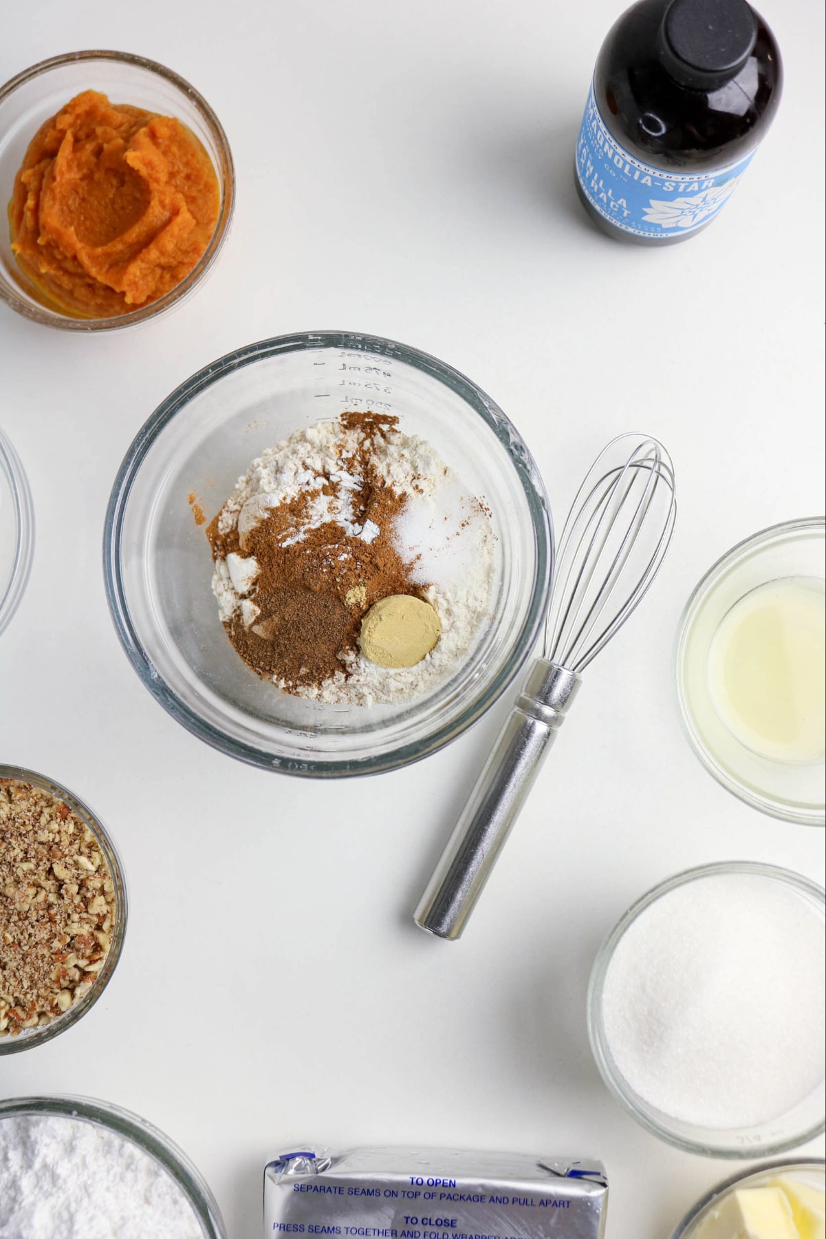 Dry ingredients in a mixing bowl before whisking together.