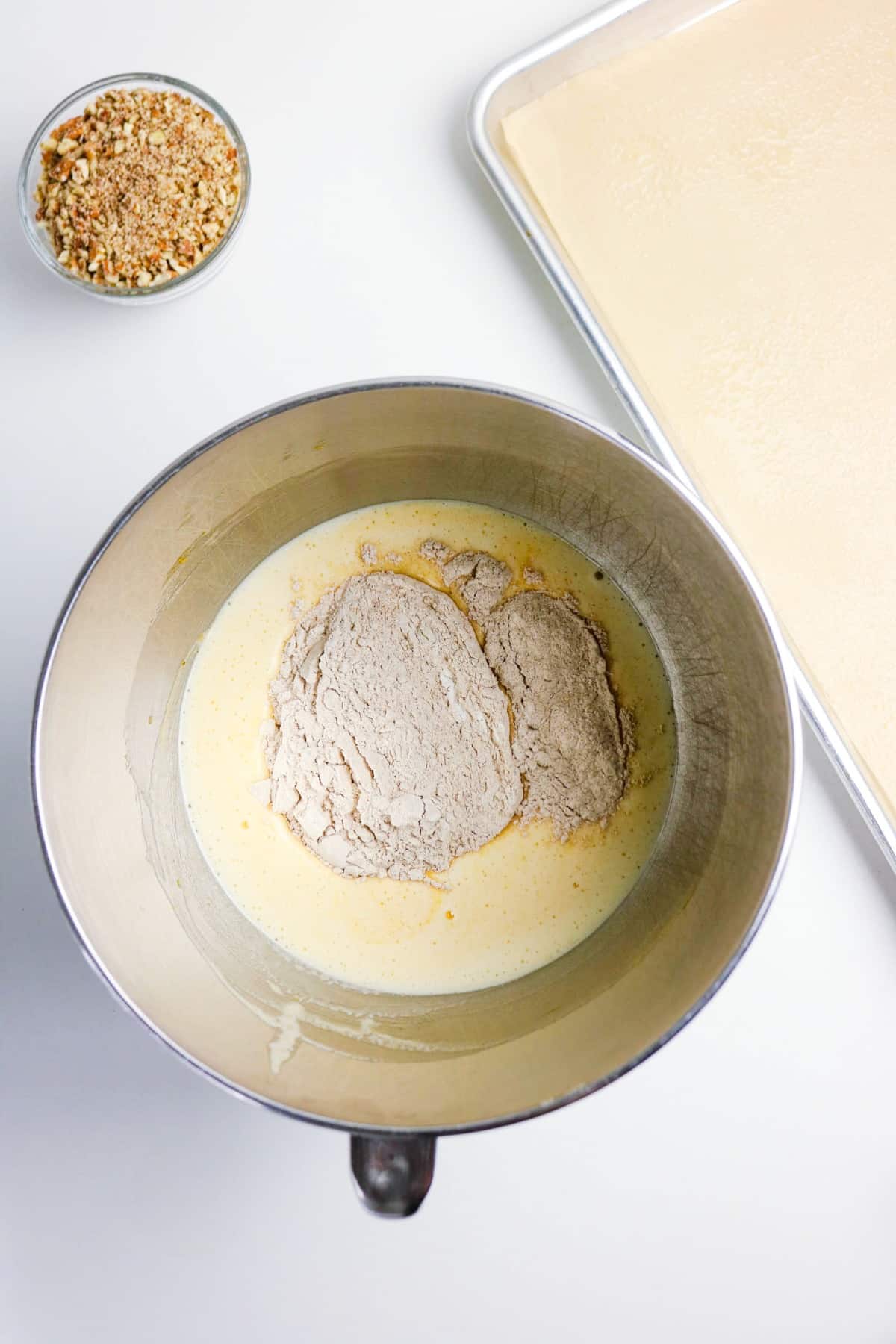 Cake flour mix added to wet ingredients before blending together.