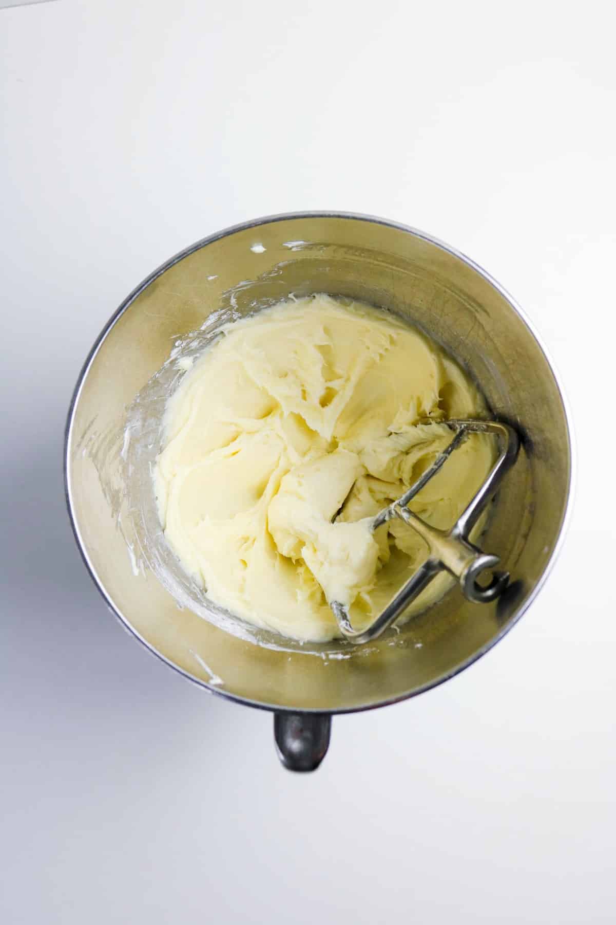 Cream cheese filling in a mixing bowl.