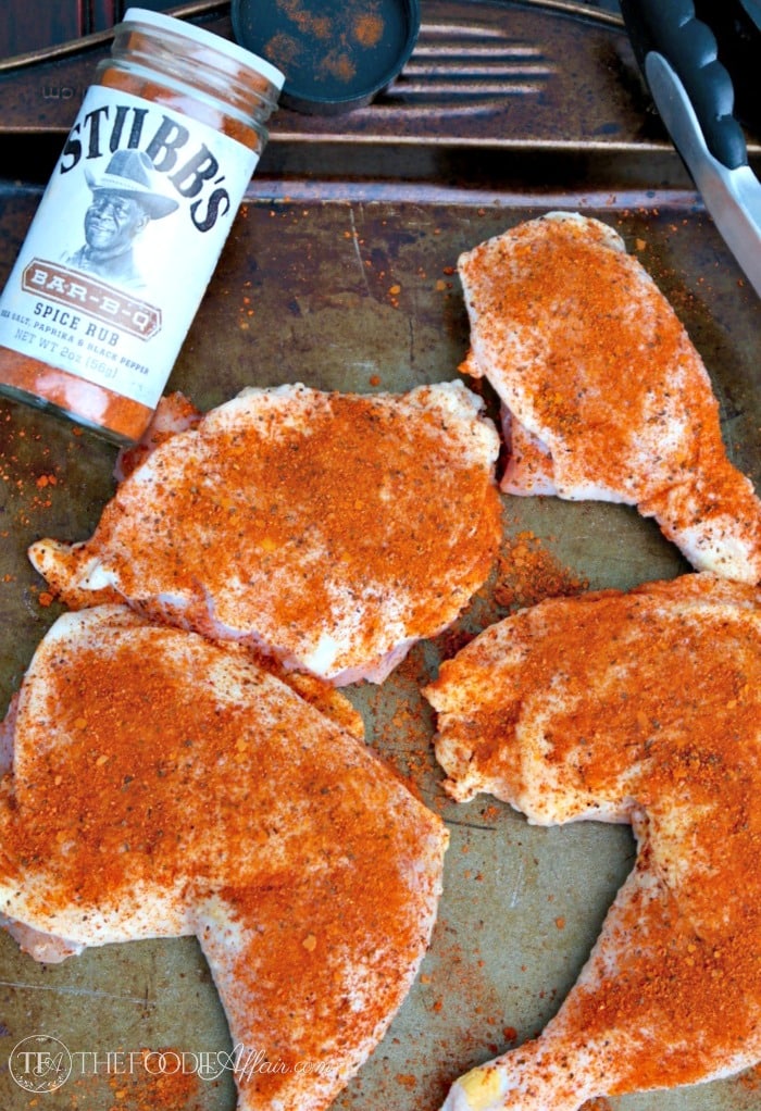 Coating of dry rub on chicken pieces 