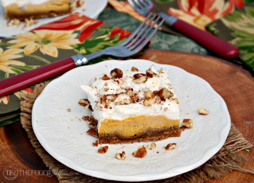 Light and airy pumpkin delight dessert is three layers of delicious flavors of gingersnap crust, creamy pumpkin filling and fresh whipped cream! The Foodie Affair