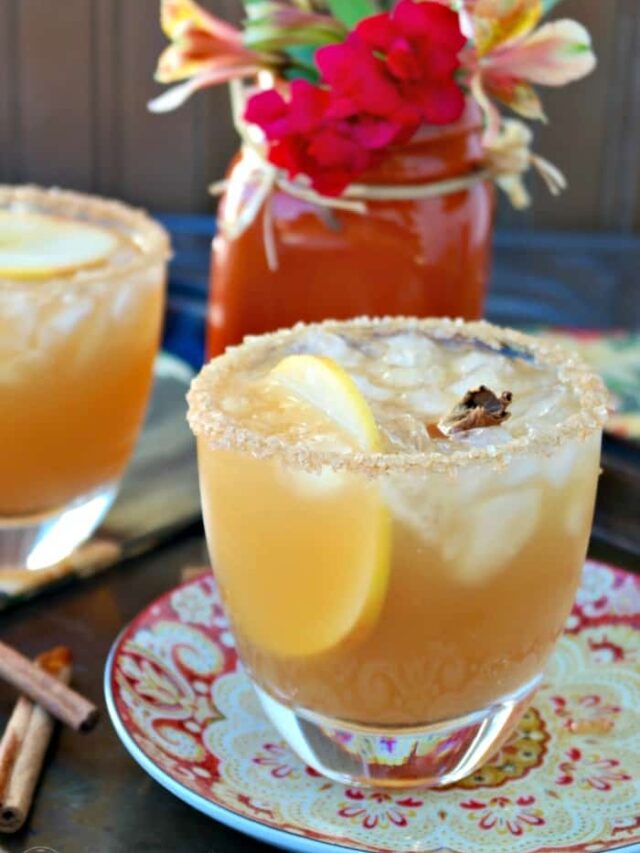 Cozy up with an Apple Cider Margarita this Fall! This classic cocktail is a delicious mix of tequila, orange liquor and apple cider. The Foodie Affair