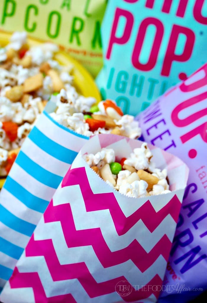 Asian popcorn snack mix to share at a party, family game night or while watching sports! This healthy BOOMCHICKAPOP is made with simple ingredients and will be your favorite low calorie snack! The Foodie Affair