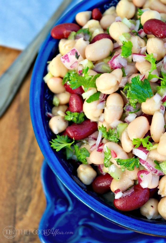 Three bean salad with a light dressing makes a delicious side dish or light lunch when served with a bed of lettuce. The Foodie Affair