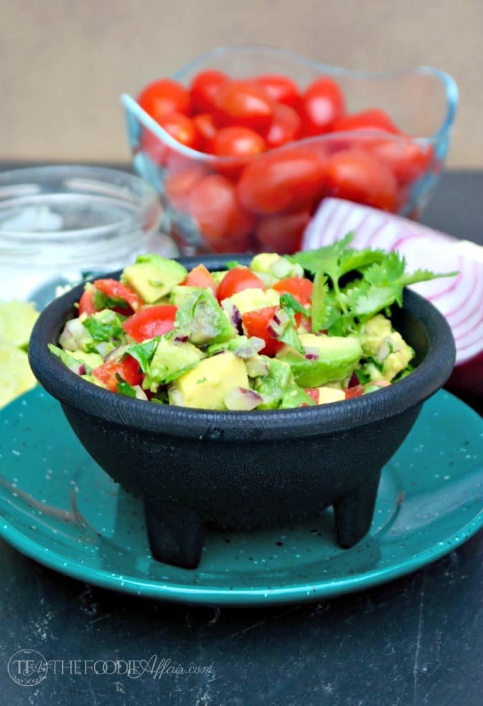 This simple Chunky Avocado Dip can be eaten with chips or served over a variety of dishes adding a healthy layer of fresh ingredients! The Foodie Affair 