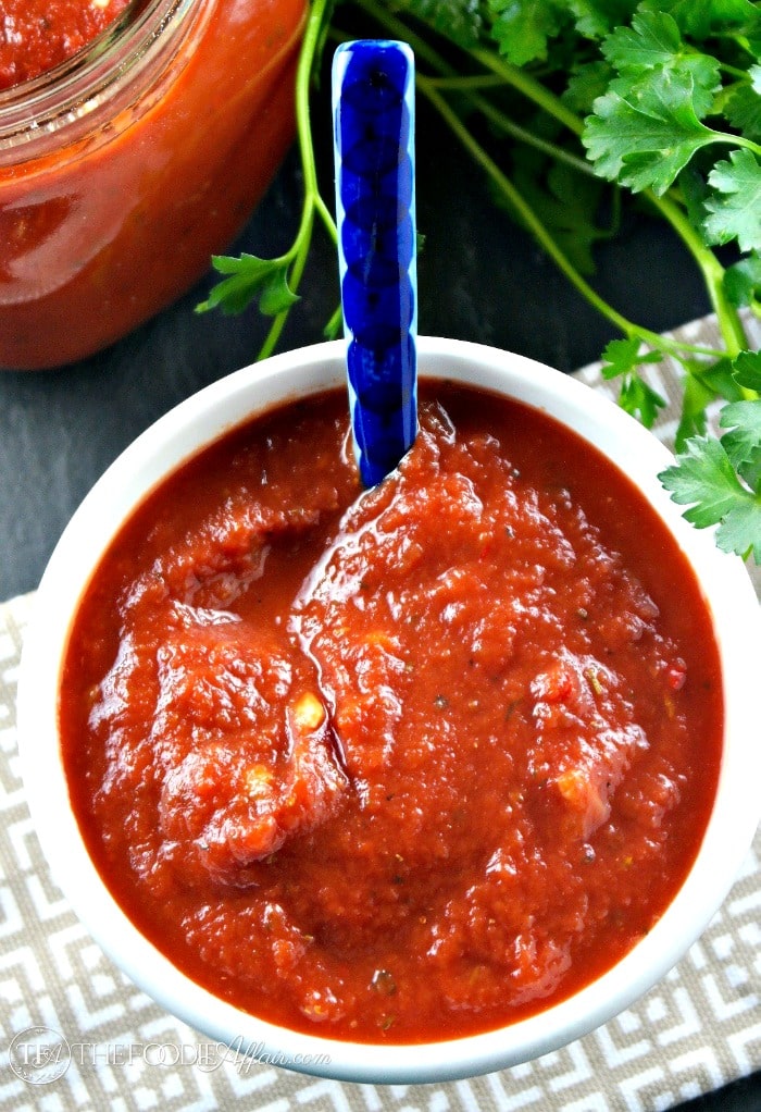 This flavorful homemade Pizza Sauce Recipe is easy to make and is think enough to be used as a dipping sauce for breadsticks too! The Foodie Affair