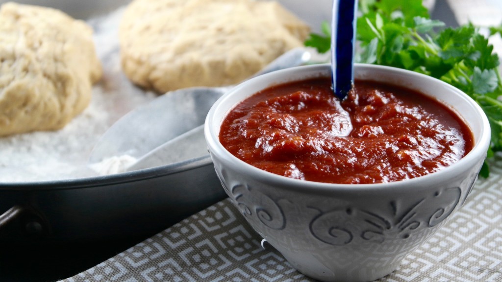 This flavorful homemade Pizza Sauce Recipe is easy to make and is think enough to be used as a dipping sauce for breadsticks too! The Foodie Affair