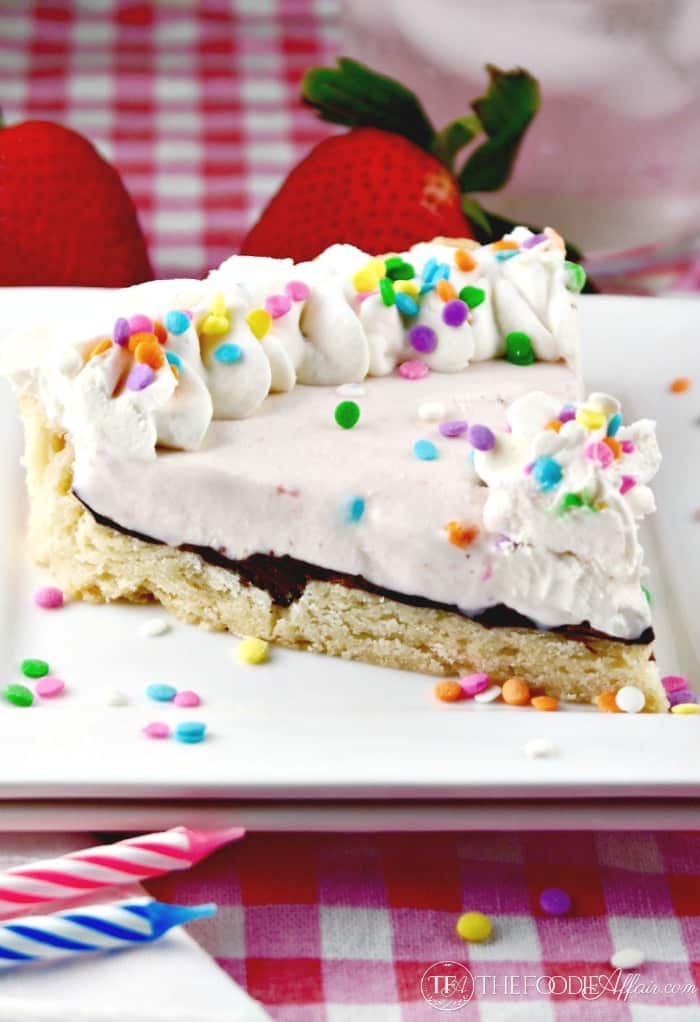 Shortbread Ice Cream Cookie Cake on a white plate with colorful sprinkles