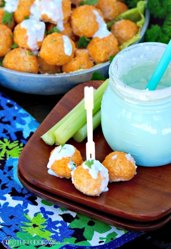 Bitesize buffalo chicken meatballs are a delicious appetizer to add to your next gathering. Dip them in homemade blue cheese dressing! The Foodie Affair