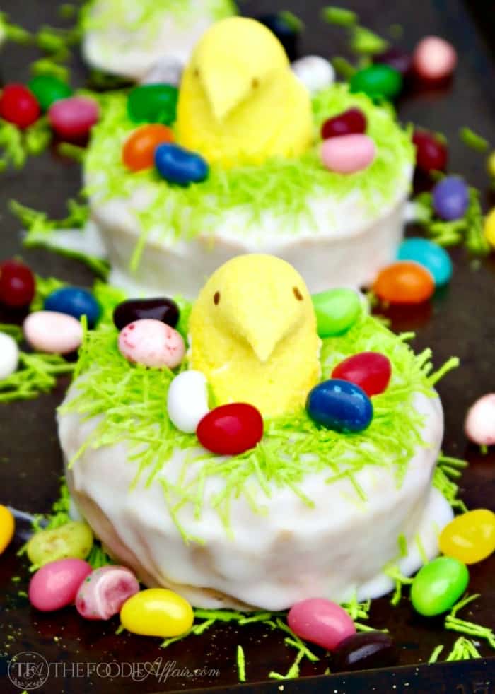 Peeps Baked Lemon Cake Donuts perched in nests are the perfect treats to add to your Easter brunch menu! Fresh lemon flavor that is sweet and slightly mouth puckering!