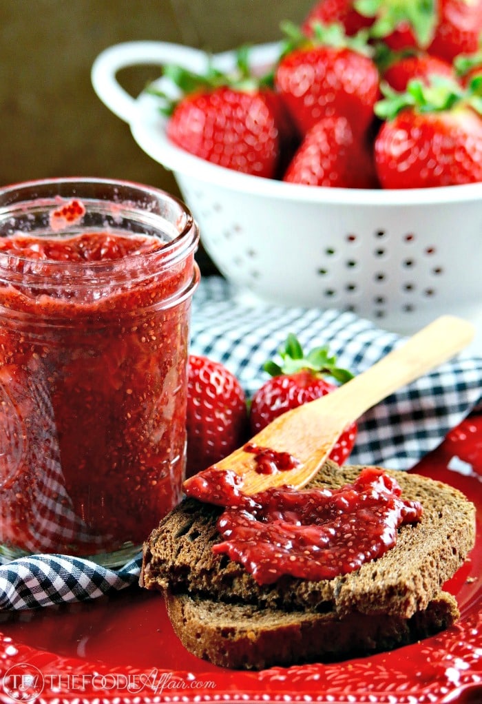 Strawberry Chia Jam spread on bread on a red plate
