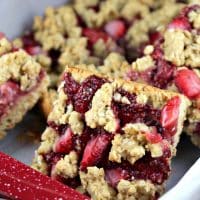 Strawberry Oat Bars with chia seed jam in a red baking pan